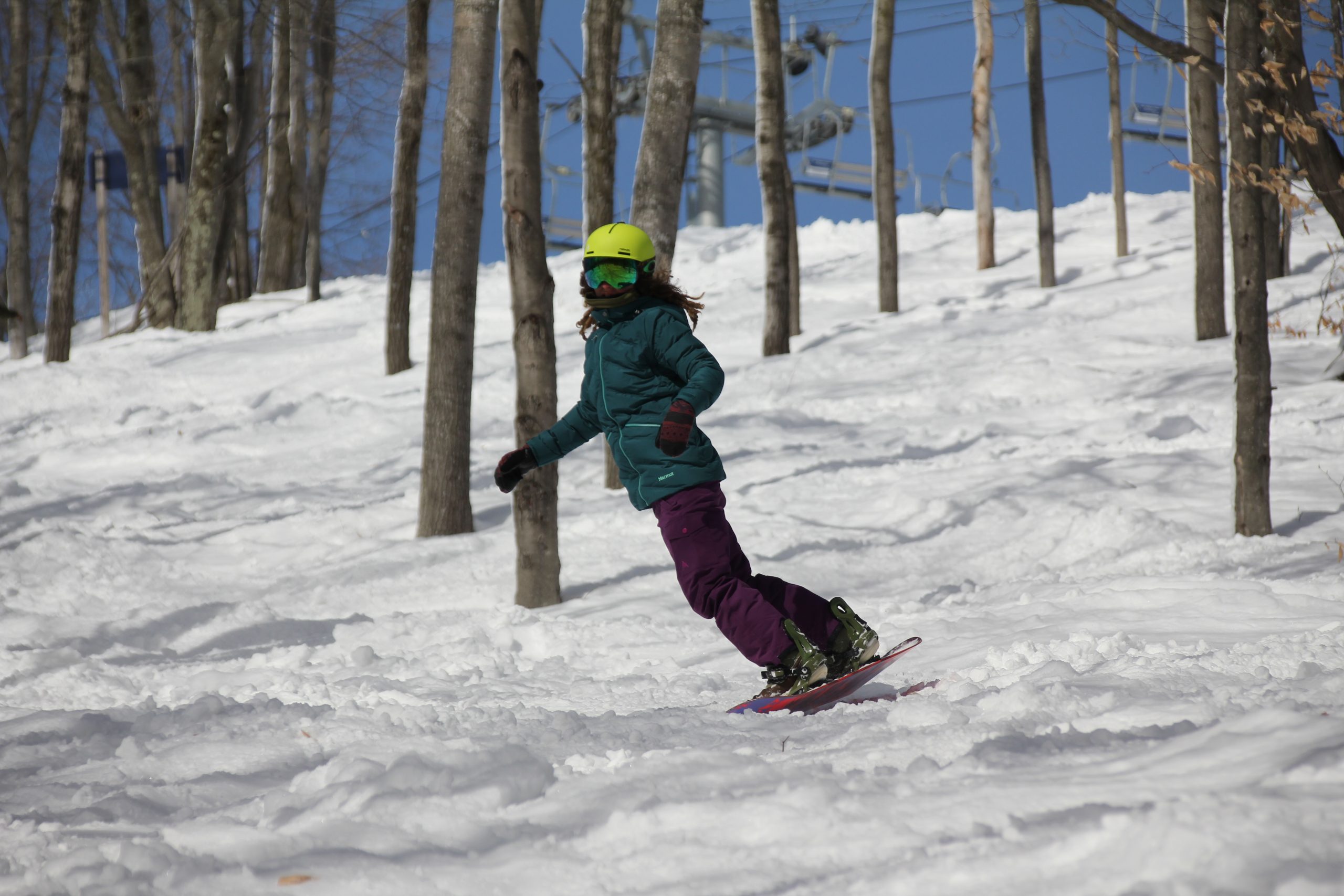 Snowboarder in the woods